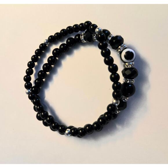 Two Stretchy Black Bracelets with Silver Toned Spacers - Picture 1 of 11